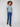 Stylish blue sweater with front cable knit design, ideal for layering in cooler weather by Charlie B.