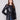 Black faux leather blazer with princess seams, offering a sleek silhouette and chic style by Charlie B.