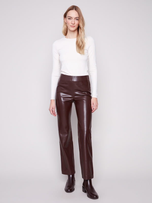 Cabernet faux leather pants featuring a straight fit and elastic waist for comfort by Charlie B.