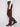 Stylish cabernet faux leather pants with an eye-catching seam above the knee by Charlie B.