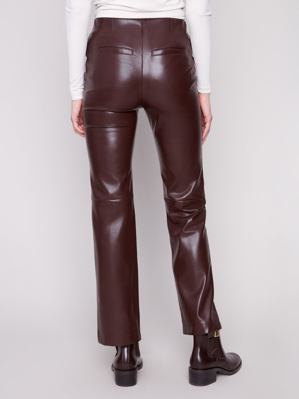 Elegant cabernet faux leather pants showcasing an elastic waistband and chic design by Charlie B.