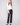 Black faux leather pants featuring a stylish straight fit and elegant design by Charlie B.