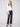 Black faux leather pants featuring a stylish straight fit and elegant design by Charlie B.