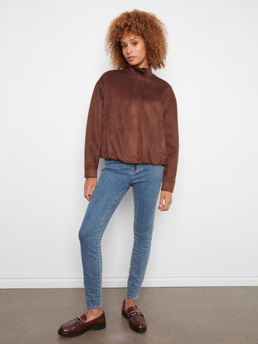Designed with a practical zipper closure, this brown jacket combines functionality with fashion effortlessly by Charlie B.