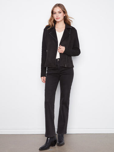 Faux suede moto jacket in black with tailored collar and rib knit back, featuring zip-front closure and zipper pockets by Charlie B.