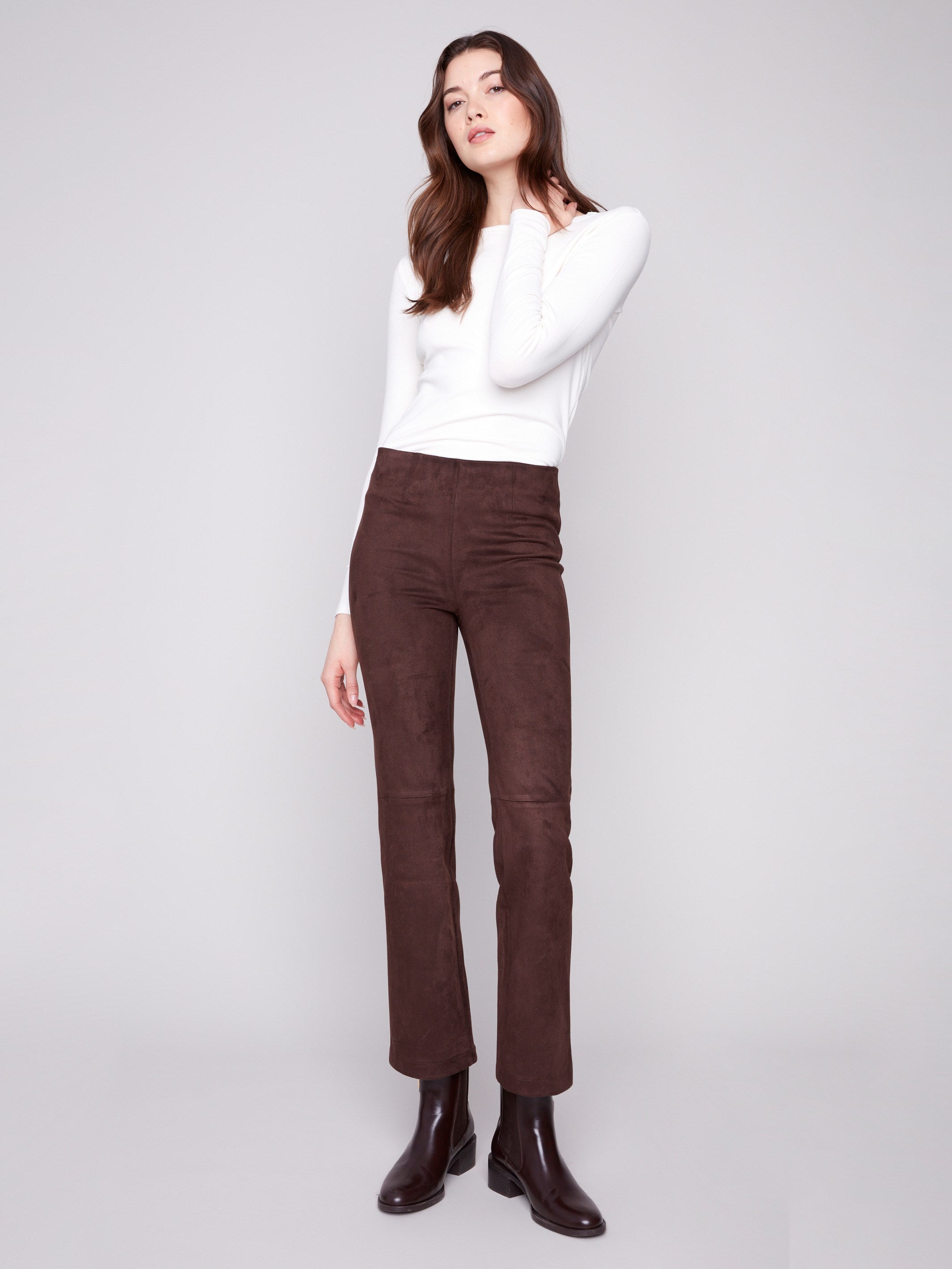 Mocha-colored pants with a straight fit and comfortable elastic waistband, crafted in stretch faux suede by Charlie B.