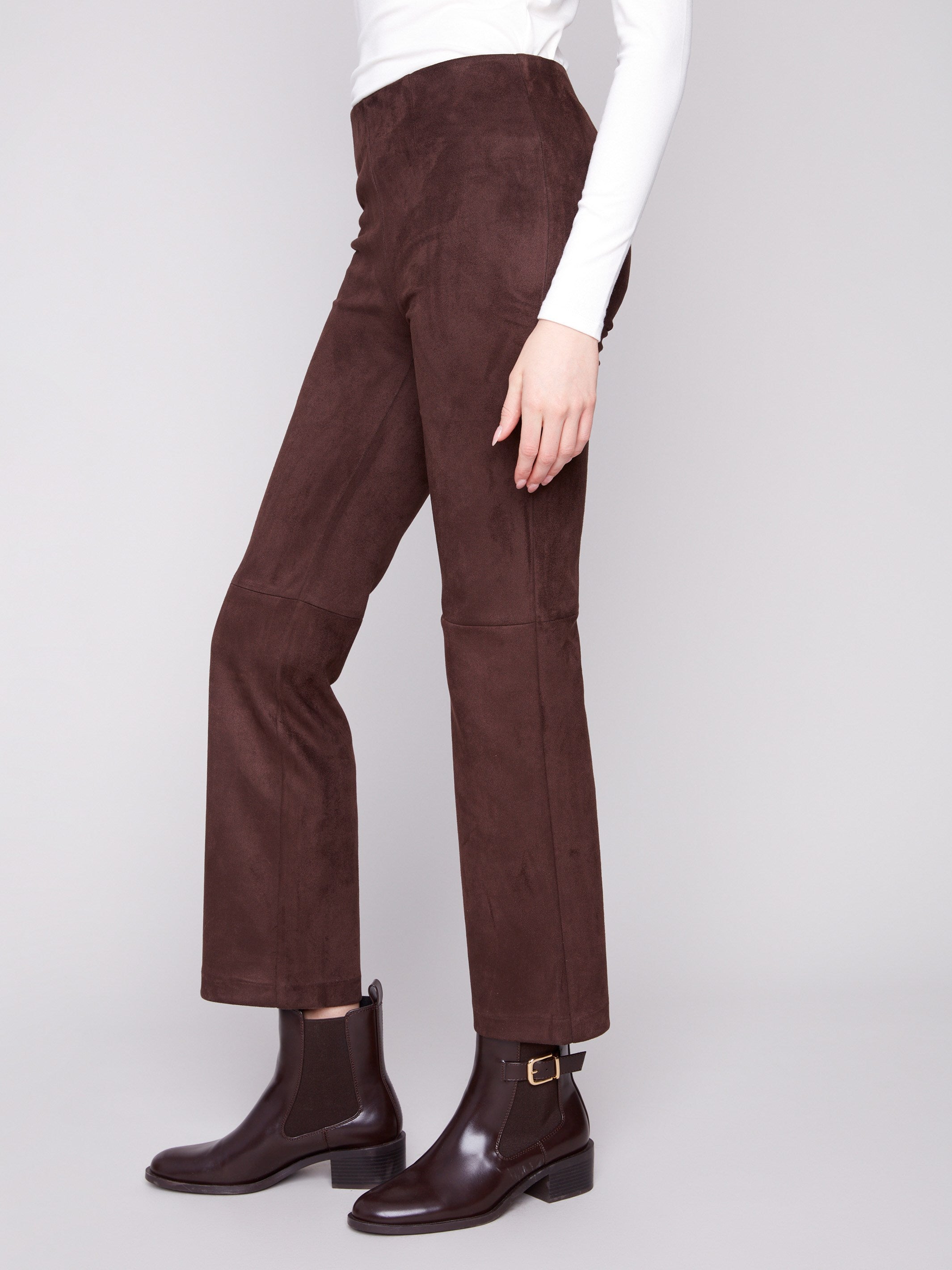 Elegant mocha pants with a seam above the knee, offering a chic look in stretch faux suede fabric by Charlie B.