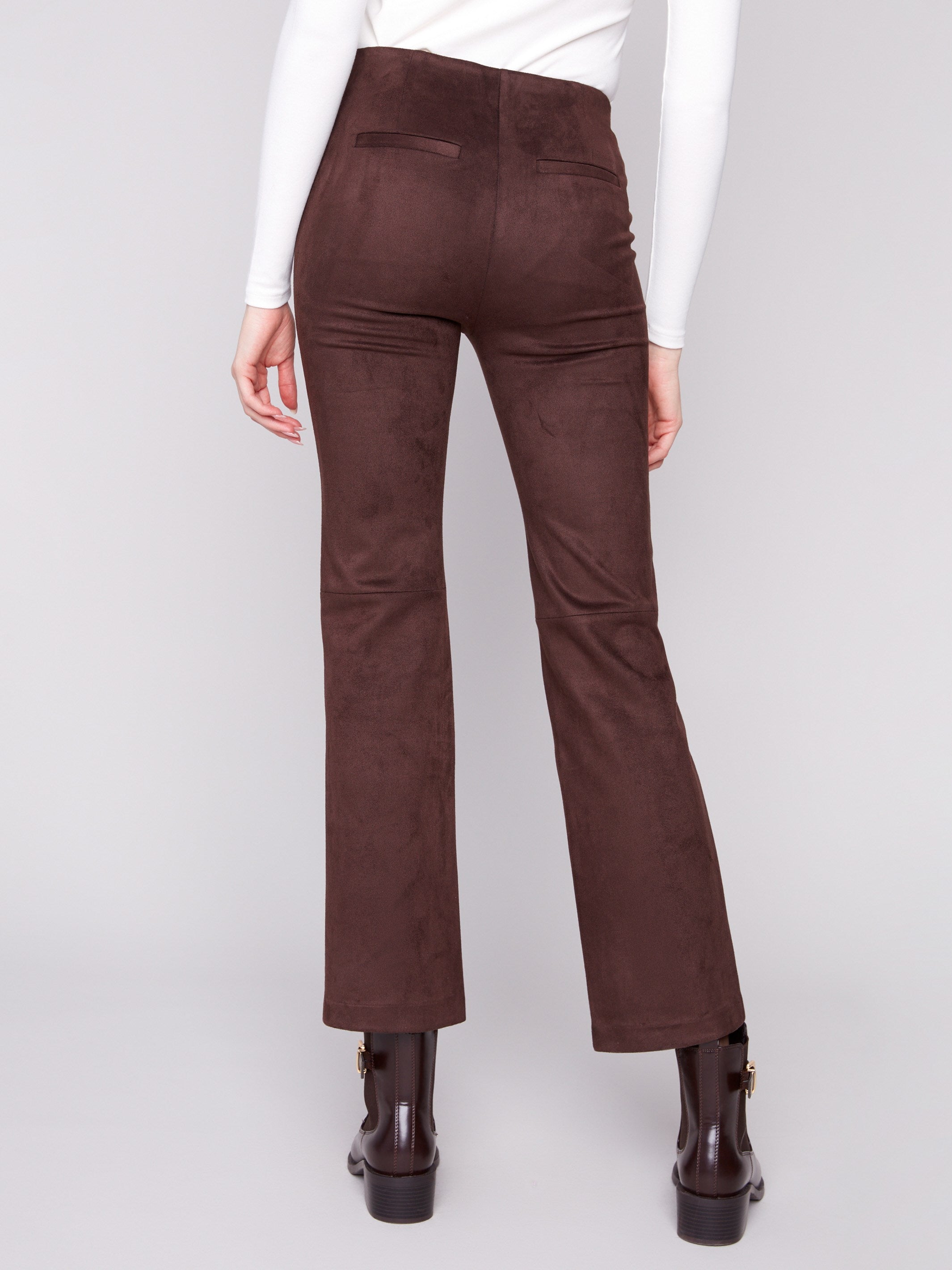 Featuring back welt pockets, these mocha-colored pants are stylishly designed for versatile wear by Charlie B.