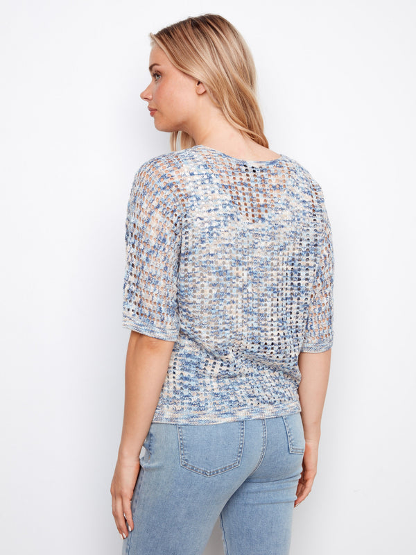 Elbow-length sleeves complement the breathable fishnet style in this versatile piece by Charlie B.