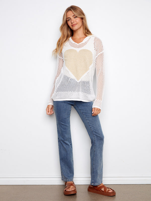 White fishnet hoodie sweater offering comfort and style, highlighted by an exquisite gold lurex heart design. By Charlie B.