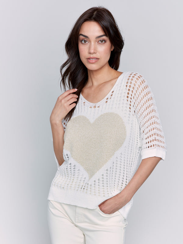White fishnet V-neck sweater with a gold heart design and 3/4 dolman sleeves by Charlie B.