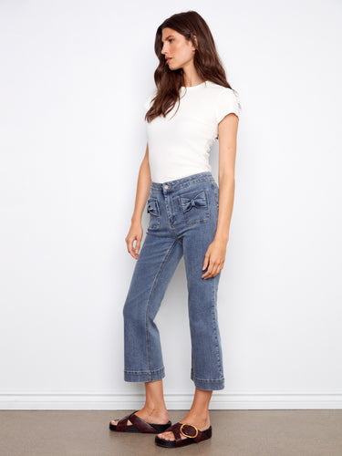 Crafted from stretch denim, these jeans provide ultimate comfort while maintaining their stylish shape all day long by Charlie B.
