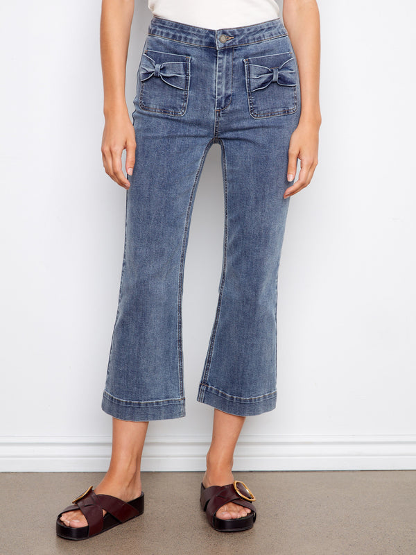 These chic stretch twill fabric pants offer both comfort and style, making them an essential piece in any collection by Charlie B.