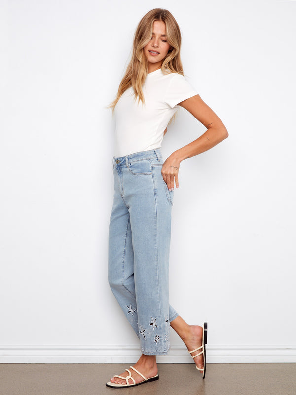 Palm tree embroidery at the hem adds a playful detail to these jeans. Perfect for casual outings by Charlie B.