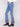 Regular rise blue jeans adorned with intricate floral designs for an elegant touch by Charlie B.