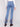 Five-pocket design blue jeans enhanced with beautiful floral embroidery for added flair by Charlie B.