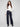 Deep blue jeans in a flare fit with stylish front buttons, offering a chic look by Charlie B.