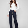 Deep blue jeans in a flare fit with stylish front buttons, offering a chic look by Charlie B.