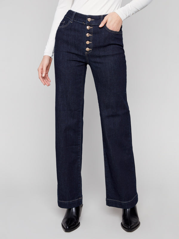 Elegant long-length jeans in deep blue with a fashionable button fly design by Charlie B.