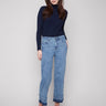 Medium blue jeans with a stylish flare fit, offering a chic look for any occasion by Charlie B.