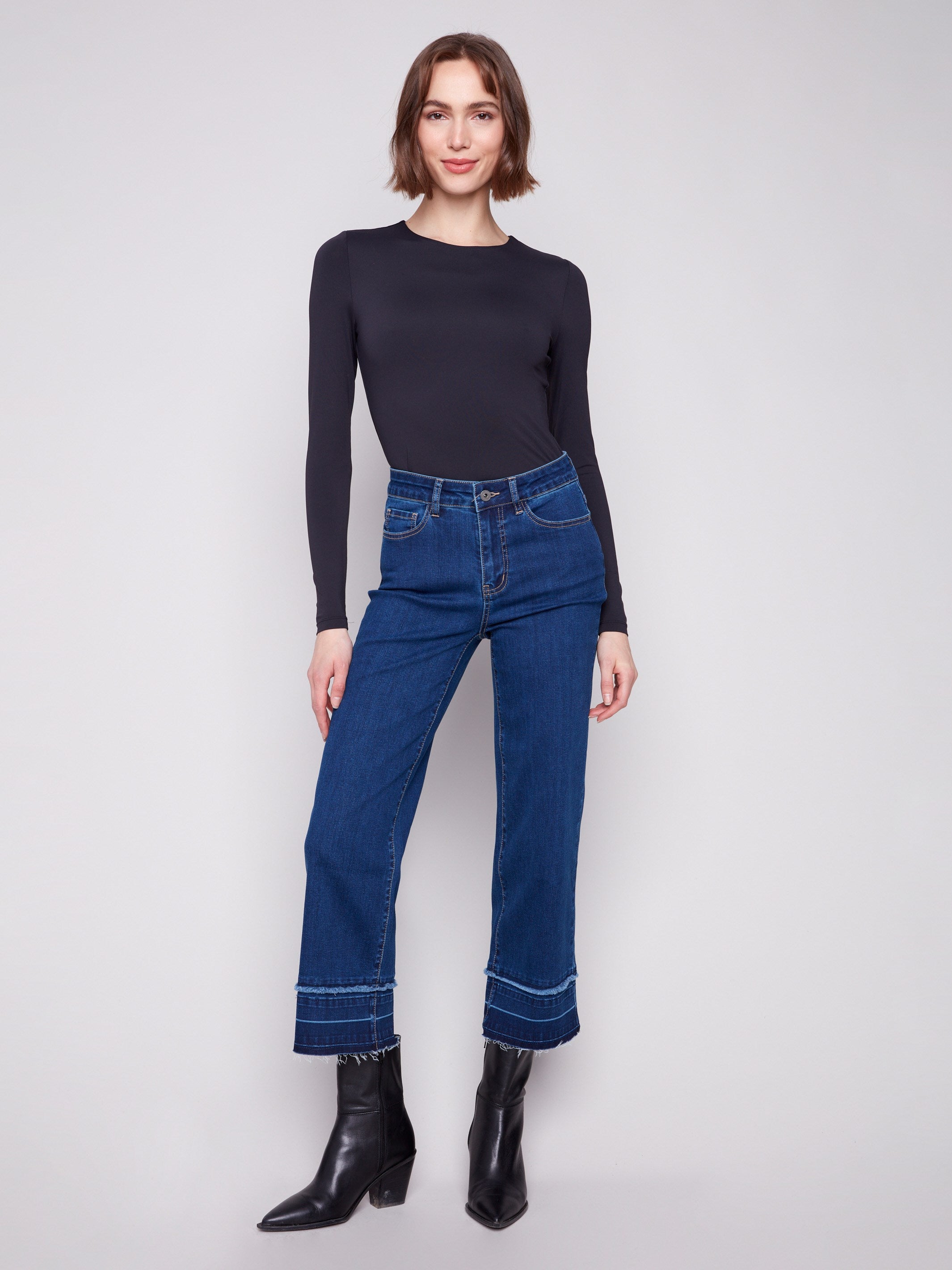 Indigo jeans with a cropped length and stylish flare fit, perfect for a modern look by Charlie B.