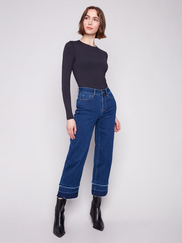 Stylish flare leg indigo jeans crafted from stretch denim material for added comfort by Charlie B.
