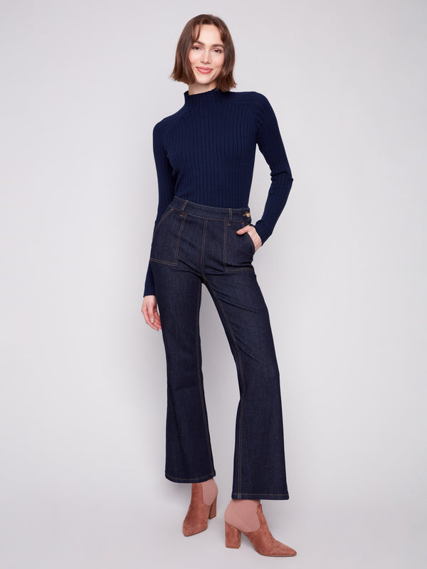 Deep blue jeans featuring a stylish flare fit and crafted from stretch denim for comfort by Charlie B.