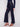 Elevate your style with these jeans, highlighted by their unique side button closure by Charlie B.