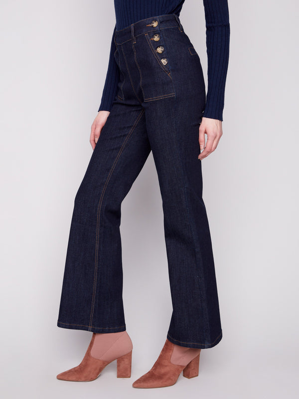 Elevate your style with these jeans, highlighted by their unique side button closure by Charlie B.
