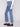 Stretch denim jeans in medium blue with regular rise and stylish side pockets, crafted by Charlie B.