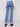 Medium blue jeans showcasing back pockets and a comfortable long length fit, created by Charlie B.