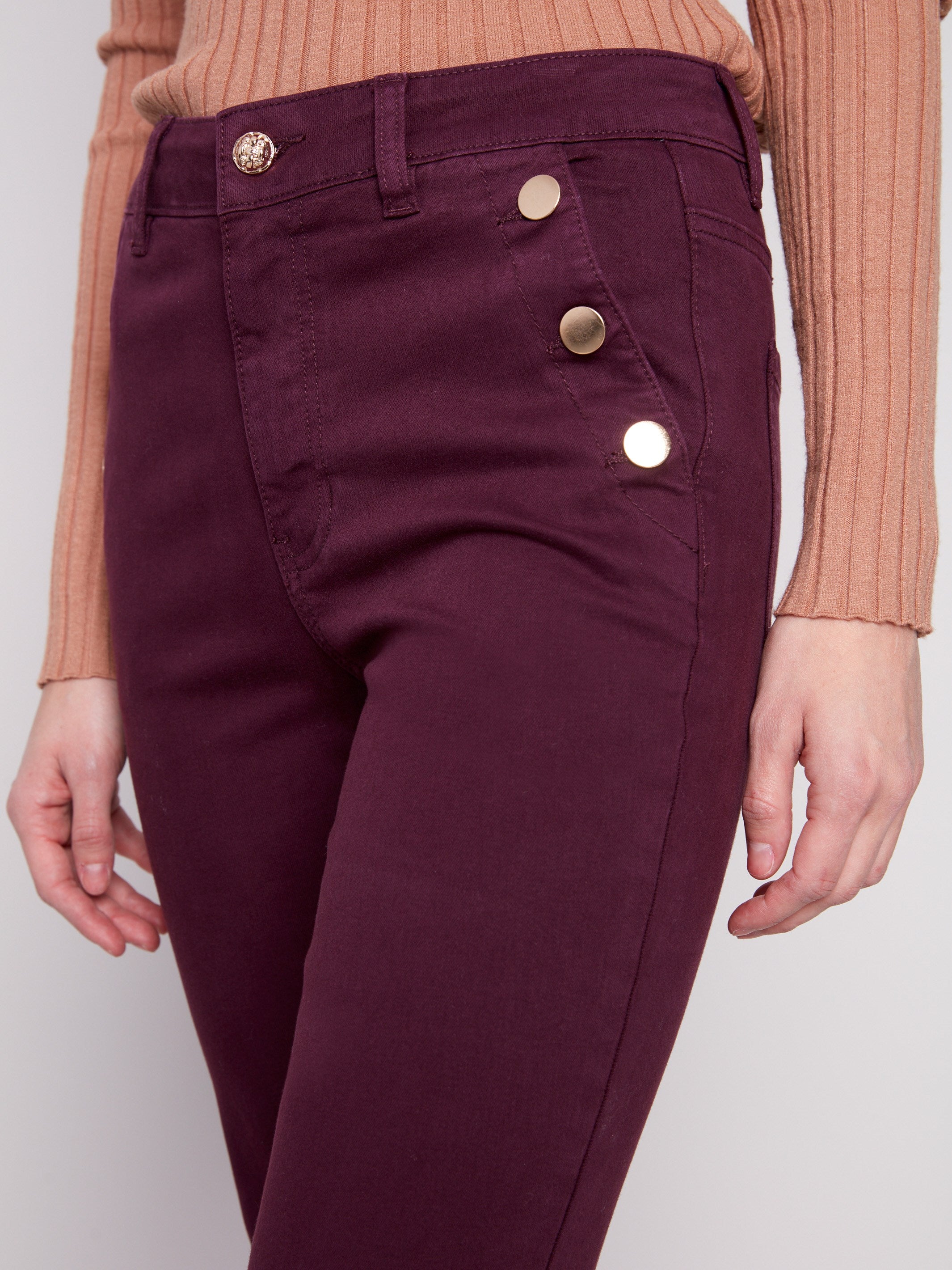 Elegant berry pants with distinctive button details on side pockets, made from quality stretch twill by Charlie B.