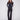 Black flare leg pants in long length featuring stretch twill fabric with stylish button accents by Charlie B.
