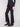 Stylish black pants showcasing button details on side pockets, crafted for a chic look by Charlie B.