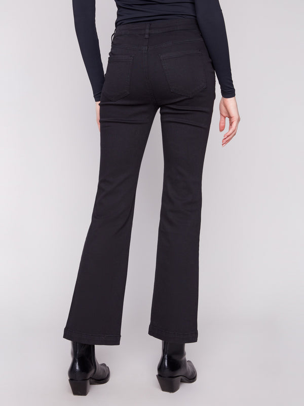 Classic black flare leg pants with regular rise and practical back pockets for added style by Charlie B.