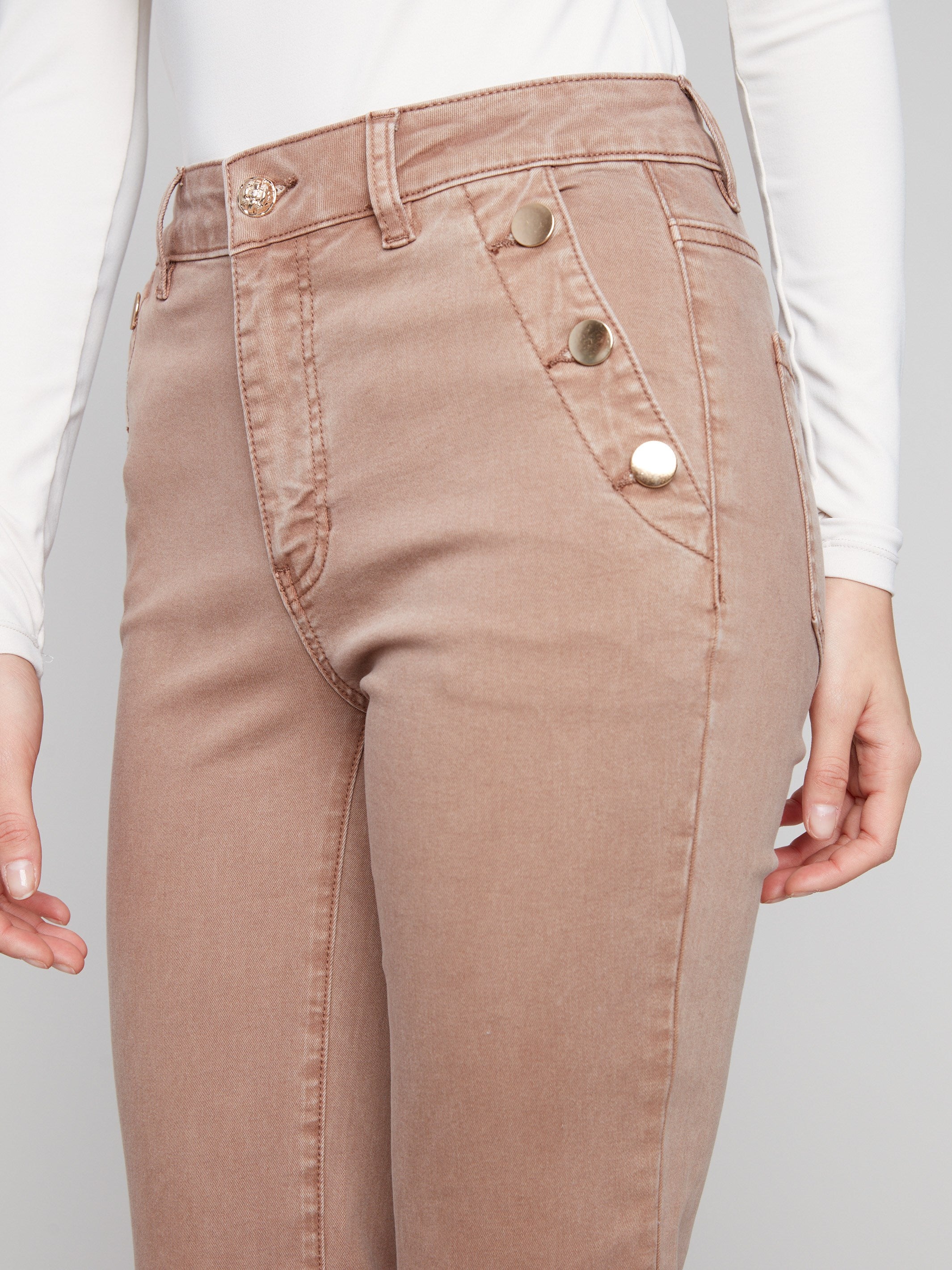 Regular rise truffle pants with eye-catching button accents on the side, blending style and function by Charlie B.
