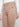 Regular rise truffle pants with eye-catching button accents on the side, blending style and function by Charlie B.