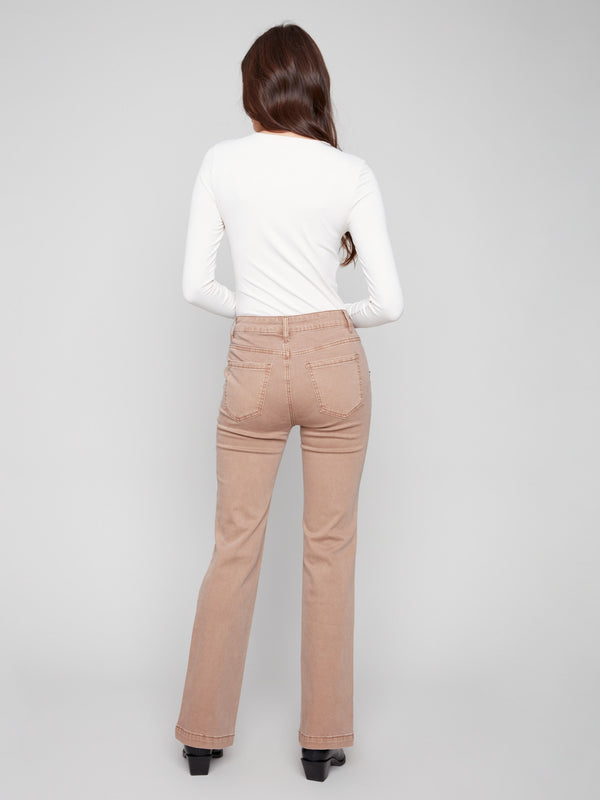 Flare leg design in these truffle pants offering a flattering silhouette with every movement by Charlie B.