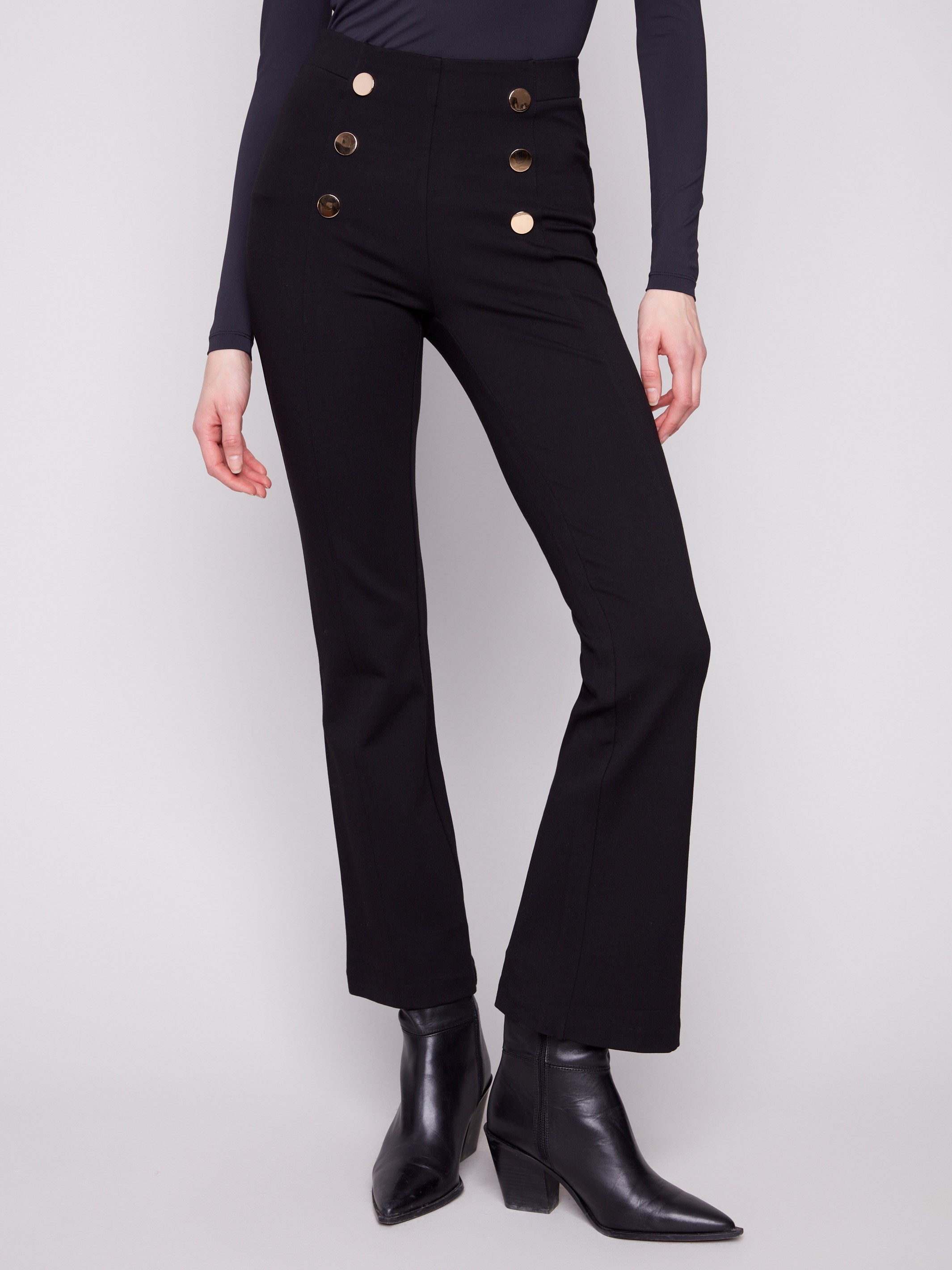 Elegant black pants with an elastic waistband and decorative buttons, crafted from stretch ponte fabric for comfort by Charlie B.