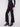 Sophisticated black pants with faux back welt pockets and chic decorative buttons, ideal for versatile styling by Charlie B.