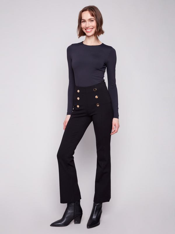 Stylish black ponte pants with a comfortable elastic waistband and elegant button details for a modern look by Charlie B.