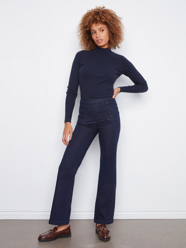 Designed with a regular rise, these jeans provide a comfortable fit around the waist by Charlie B.