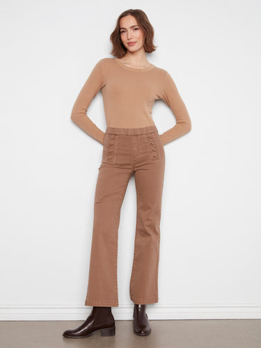 Brown flare jeans with a regular rise, offering a stylish fit and comfort by Charlie B.