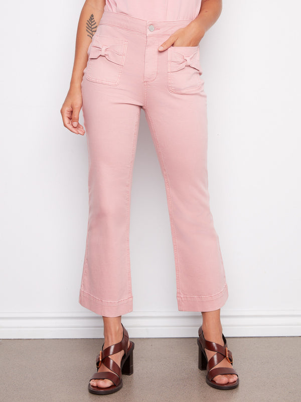 Showcasing bow patch pockets, these pants add a touch of elegance to any outfit. Designed with care by Charlie B.
