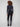 Featuring a unique washed frayed hem and classic five-pocket design in stretch denim by Charlie B.