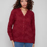 Cabernet blouse with a flattering V-neckline and floral applique, crafted from premium cotton for comfort by Charlie B.