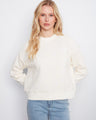 Buttercream sweatshirt featuring a relaxed fit and elegant floral soutache design, perfect for casual wear by Charlie B.