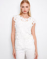 This elegant top features a crew neckline, adding a touch of sophistication to any outfit. Perfect for casual or formal occasions by Charlie B.