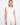 This elegant top features a crew neckline, adding a touch of sophistication to any outfit. Perfect for casual or formal occasions by Charlie B.