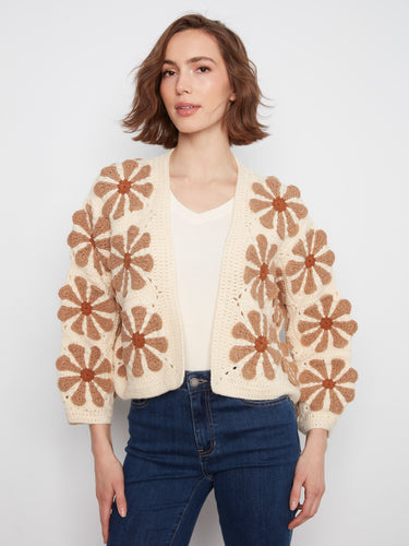 Chic ecru crochet cardigan with cropped length, embellished with large handcrafted florals and open front by Charlie B.